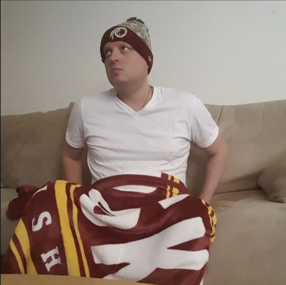 Andrew watching a Washington football game